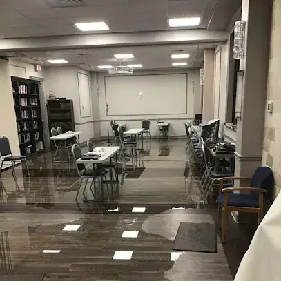 Standing water across the floor of a Monroe Township office meeting room